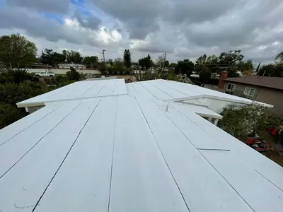 Smart Roofing project - New Flat Roof Installation - White Polyfresko Single-Ply Membrane in Los Angeles
