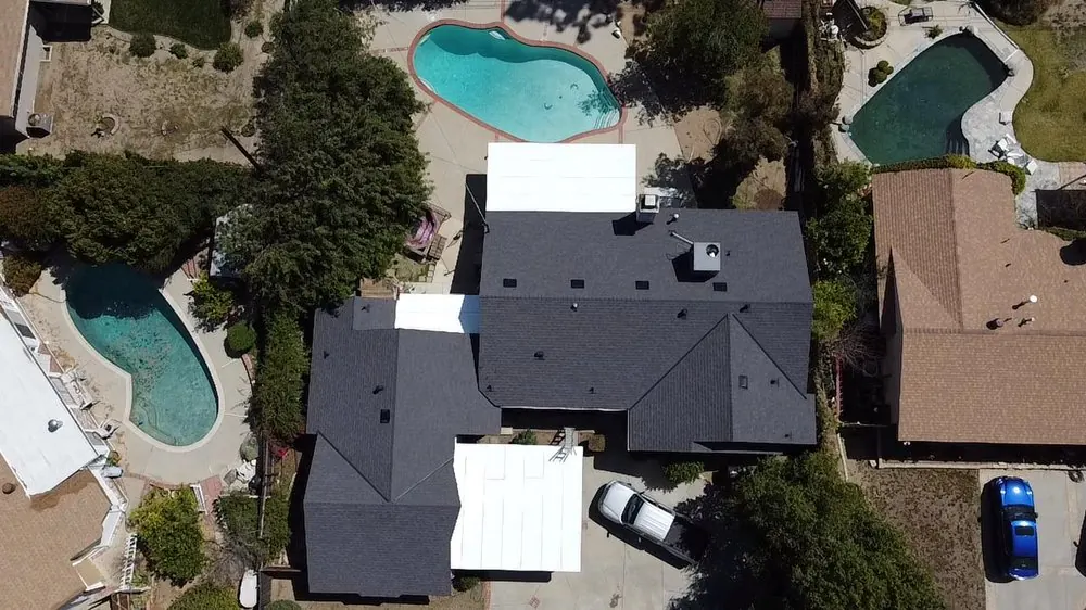 Smart Roofing project - Asphalt Shingle Roof Replacement - Light Gray Gabled Roof in Los Angeles