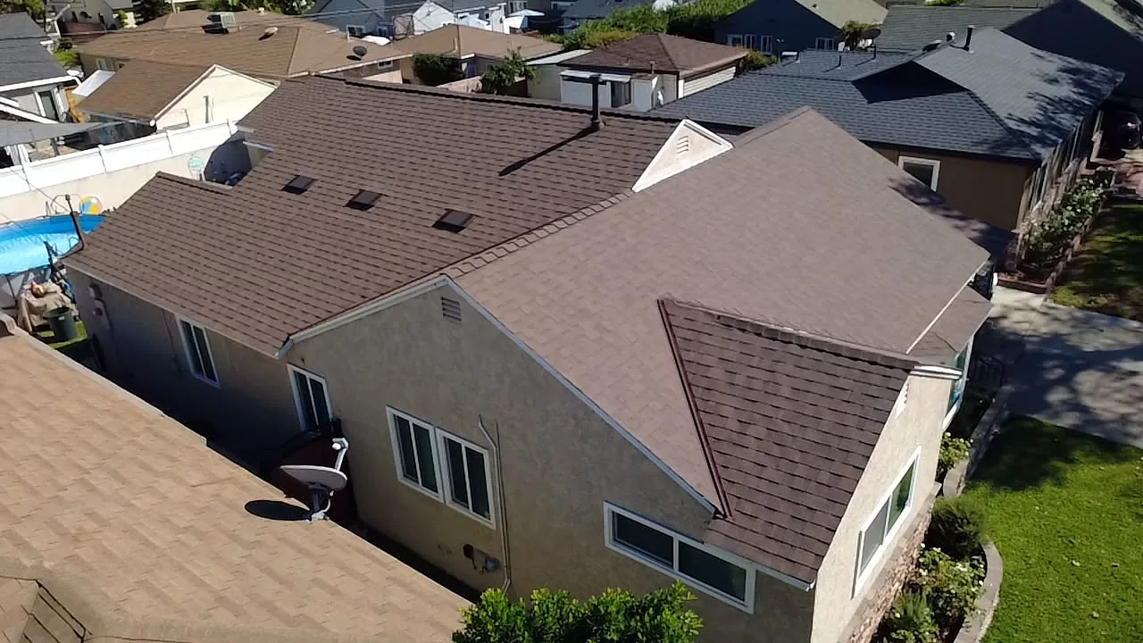 Aerial view of a Copper Trail asphalt shingle roof with skylights in Lakewood, CA