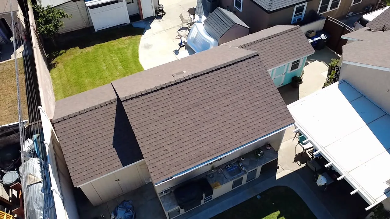 Drone view of Copper Trail roof planes and patio cover in Lakewood, LA County